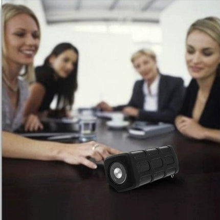 Outdoor Bluetooth Speaker With Built In Power Bank For Travel on conference table 10W waterproof 5200mAh battery