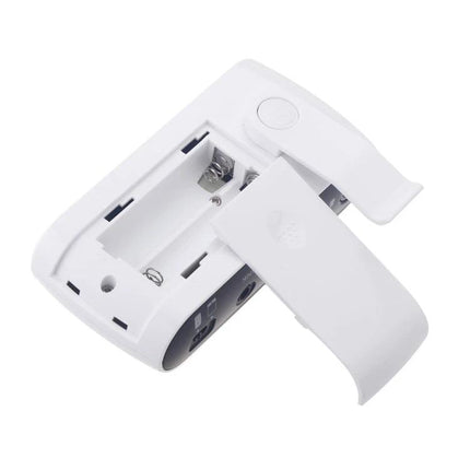 Compact JOYO I-PLUG Amplifier for Everyday Guitar Practice clipped to belt with open battery compartment and headphone jack