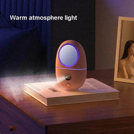 Makeup Mirror Spray For Daily Hydration During Routine nano-fine mist device with HD mirror and warm atmosphere light on bedside table