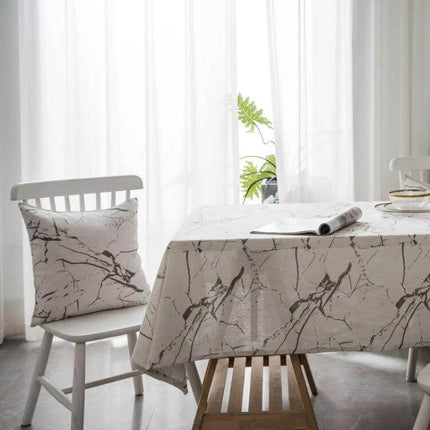 Marble Pattern Tablecloth For Dining And Home Use, Cotton Linen on a rectangular dining table with matching cushion in a bright minimalist room