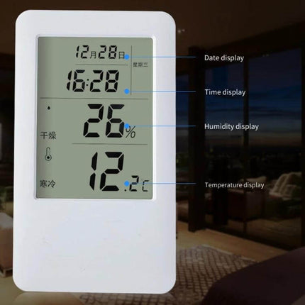 MC501 Adjustable Indoor Thermometer Hygrometer For Home Or Office Use showing date, time, 26% humidity and 12.2°C temperature on a large display