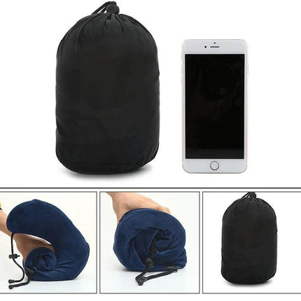 Memory Foam U-Shaped Travel Pillow For Neck Support compact navy velvet pillow in carry bag next to smartphone, rolled and packed