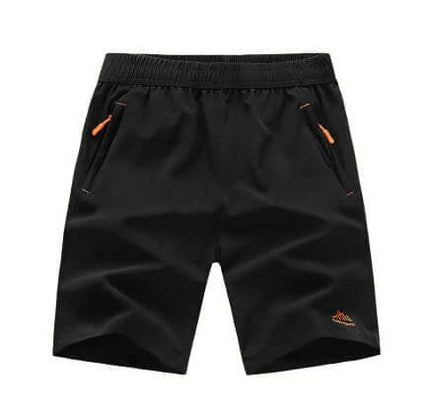 Men's Loose Running Capris Mid Waist Available In Large Sizes - Black mid-waist loose running capri shorts with zip pockets