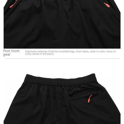Men's Loose Running Capris Mid Waist Available In Large Sizes Black mid-waist breathable polyester capris with elastic waistband and zip pockets