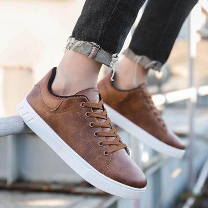 Men's Low-Top Lace Up Casual Shoes For Everyday Wear in dark brown PU with white sole, breathable mesh lining and casual jeans styling