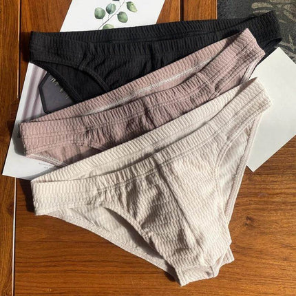 Men's Pure Cotton Triangle Underwear Solid Color Shorts - three breathable mid-rise triangle briefs in black, mauve, and beige for daily wear