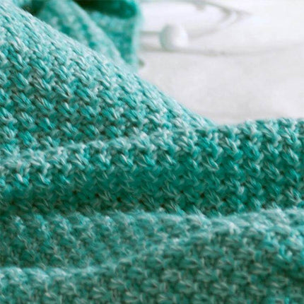 Mermaid Tail Blanket For Adults Soft Knitted Throw in teal acrylic knit close-up showing soft coral fleece-like texture for cozy movie nights