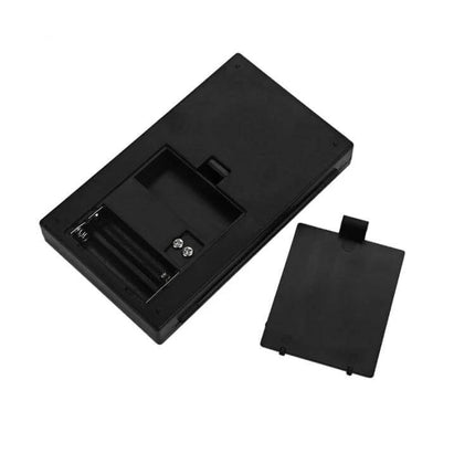 Compact Portable Jewelry Scale For Diamonds And Gold – compact black mh-8015 scale with battery compartment and removable cover, ideal for jewelers and appraisers