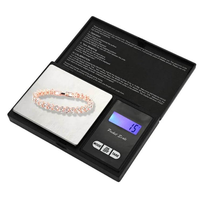 Compact Portable Jewelry Scale For Diamonds And Gold displaying bracelet on weighing platform with blue LCD readout and tare/mode buttons