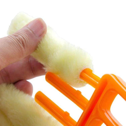 Microfiber Blinds Cleaning Brush With Detachable Roller shown with removable microfiber roller being attached to orange handle for blind cleaning