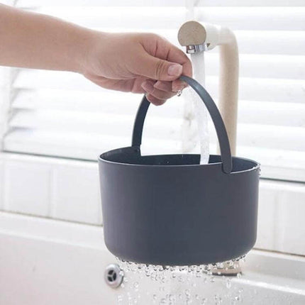 Microwave Rice Cooker 2L Steamer Pot For Easy Rice - compact food-grade PP pot being rinsed under tap, ideal for dorms and small kitchens