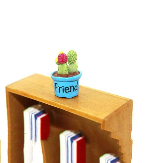 Mini Blue Potted Plant For Dollhouse Decor Tiny Home Scene small clay cactus in blue pot labeled 'Friend' on miniature wooden shelf 1/12 scale