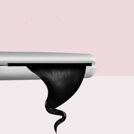 Mini Hair Straightener And Curler One Button Operation showing compact white styler curling a single black hair strand into a spiral
