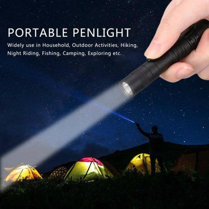Mini LED Pen Shaped Flashlight With Clip For Everyday Tasks - compact aluminum penlight with pocket clip shining over camping tents at night