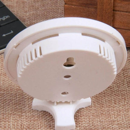 Mini Round Analog Hygrometer For Indoor Outdoor Use white compact 7.5cm dial on tabletop stand showing rear vents and mounting holes