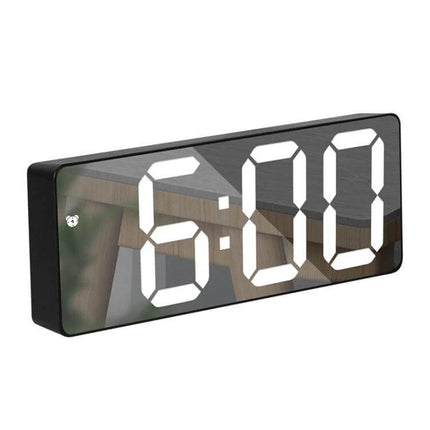 Mirror Bedside Alarm Clock Arc Shaped On Nightstand digital mirror display on a nightstand with large white LED time reading