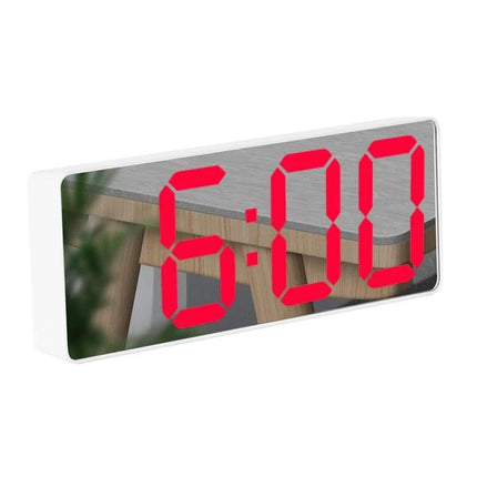 Mirror Bedside Alarm Clock Arc Shaped On Nightstand showing large red LED 6:00 time on reflective mirror surface with white ABS frame
