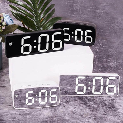 Mirror Bedside Alarm Clock Arc Shaped On Nightstand - compact mirrored ABS digital alarm clock on nightstand showing 6:06 with voice control option