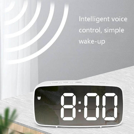 Mirror Bedside Alarm Clock Arc Shaped On Nightstand with reflective mirror face digital display and voice control on a wooden nightstand