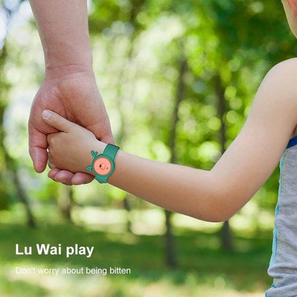 Mosquito Repellent Wristband For Children Outdoor Play — child wearing green silicone wristband in park held by adult hand