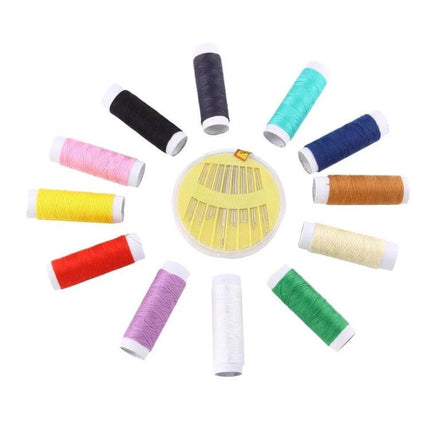 Multi-Color Sewing Box With Needle Accessories And Pins featuring colorful spools of thread arranged around a needle set for mending and crafts