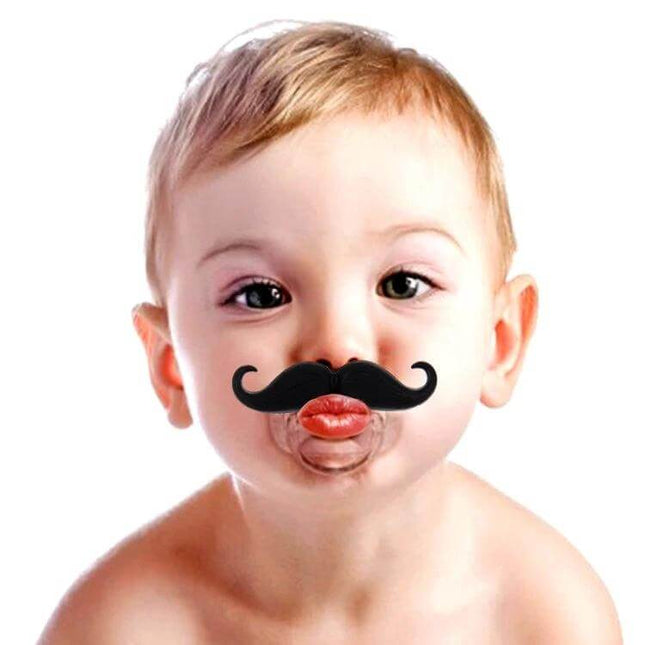 Mustache Baby Teether Soft Nipple For Soothing Gums - hand holding black mustache-shaped silicone nipple teether for soothing baby gums