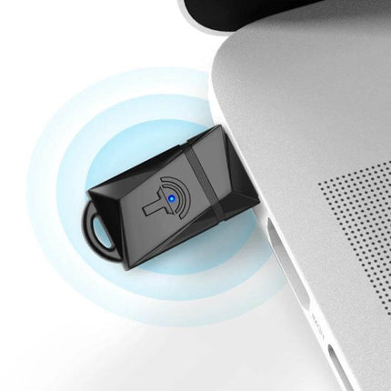 Rocketek Wireless USB Adapter for Easy Internet Access plugged into laptop USB for WiFi connectivity and streaming
