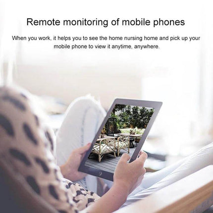 VESAFE Solar Powered Outdoor Security Camera for Home Monitoring showing remote monitoring on a tablet with outdoor patio footage