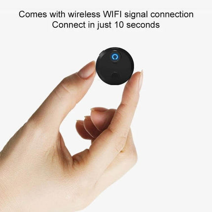 Compact HD WiFi Mini Camera for Home Surveillance with Night Vision held between fingers, compact 1080P WiFi camera with night vision and quick 10-second setup