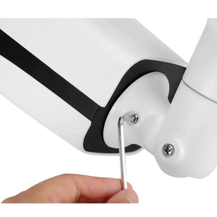 Weatherproof Indoor Surveillance Camera with Zoom and Night Vision mounted and being adjusted with hex key, close-up of white housing and arm