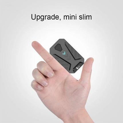 Essential GAMWING Accessory for Daily Mobile Gaming Use compact Bluetooth adapter held between fingers for keyboard and mouse connection