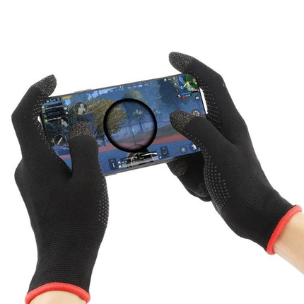 Comfortable Gloves for Touch Screens in Daily Life — black touchscreen knit gloves with grip dots shown using smartphone outdoors