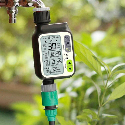 NADSTER Garden Waterer With Timed Rain Sensor Single Outlet attached to outdoor faucet showing digital timer and rain sensor
