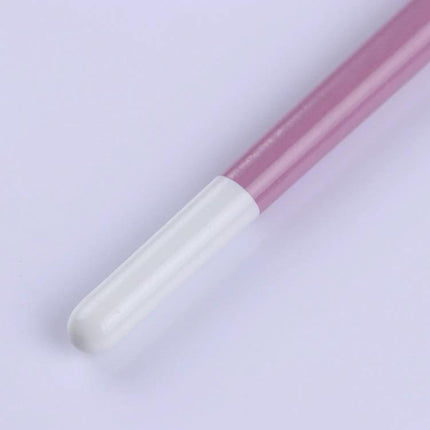 Nail Art Brush Set With 7 Heads For Detailing And Patterns - close-up of pink metal handle brush tip for precise nail detailing