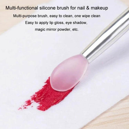 Nail Art Silicone Applicator Sticks 2-Pack For Powder And Eyeshadow pink silicone tip applying red lip gloss on white background