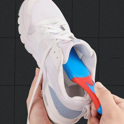 Nano Brush Soft Cleaning Brush For Shoes And Clothes gently cleaning sneaker interior with curved handle and soft nano-filament bristles