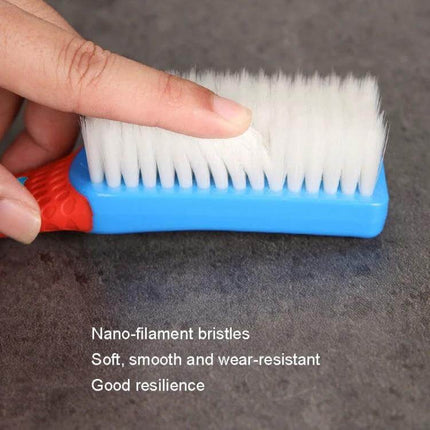 Nano Brush Soft Cleaning Brush For Shoes And Clothes - close-up of soft white nano-filament bristles on blue handle, gentle on sneakers and fabrics