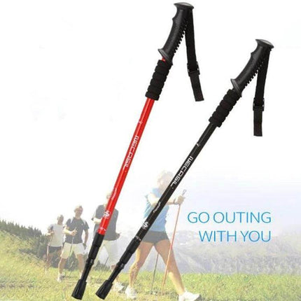 Necasil Three Section Aluminum Trekking Pole Black shown in red and black with ergonomic plastic handles and carbon steel tips for hiking