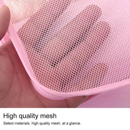 Alt Tag: NIBESSER Travel Mesh Packing Cube Set For Clothes, 6 Piece pink breathable mesh close-up showing hand through fabric