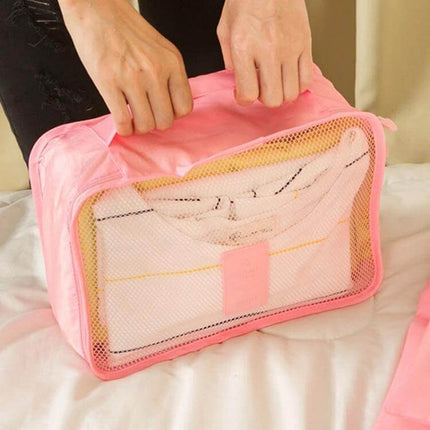 NIBESSER Travel Mesh Packing Cube Set For Clothes, 6 Piece pink mesh cube showing folded shirt and handle