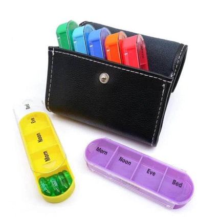 Notebook-Style 28-Compartment Portable Pill Box With Leather Bag showing seven detachable colorful 4-compartment daily pill cases and black leather notebook organizer