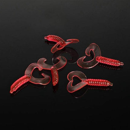 101 Piece Fishing Lure Kit With Plastic Box For Everyday Fishing - red soft plastic grub lures displayed on black background