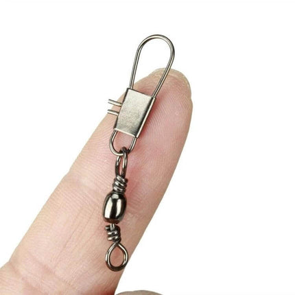 Fishing Barrel Swivel With Snap Ring, 3.5cm, 8G, 20 Pack - close-up on fingertip showing copper alloy swivel and snap ring for quick lure changes