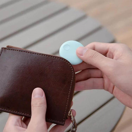 Xiaomi Youpin Bluetooth Anti-Lost Device for Tracking Items attached to a wallet to locate keys and belongings
