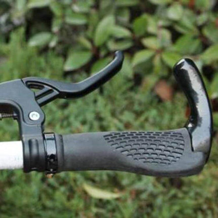 Mountain Bike Alloy Brake Levers Pair, Lightweight Aluminum, Black — close-up of black left brake lever and ergonomic grip on 22 mm handlebar