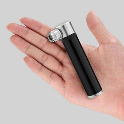 Manual Mini Portable Bicycle Pump Kit With Glue Free Patches And Tire Levers compact aluminum hand pump shown in palm — lightweight frame-mount inflator
