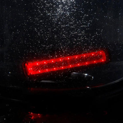 Rainbow Bike Tail Light USB Rechargeable For Night Riding - compact PC housing rear red LED tail light on wet urban bike for improved night visibility
