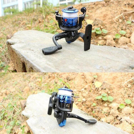 JL200 Spinning Reel With 3 Ball Bearings For Everyday Fishing on a rock, compact blue spinning reel for freshwater shore and lake use