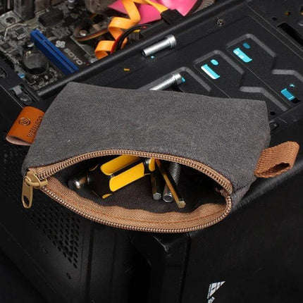 Electrician Tool Carrying Bag For Hand Tools Khaki small waxed-oxford pouch with screwdrivers, pliers and screws on computer case
