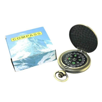 Vintage Metal Flip Pocket Watch Compass for Hiking and Camping — compact zinc alloy flip compass with vintage finish shown open next to blue box